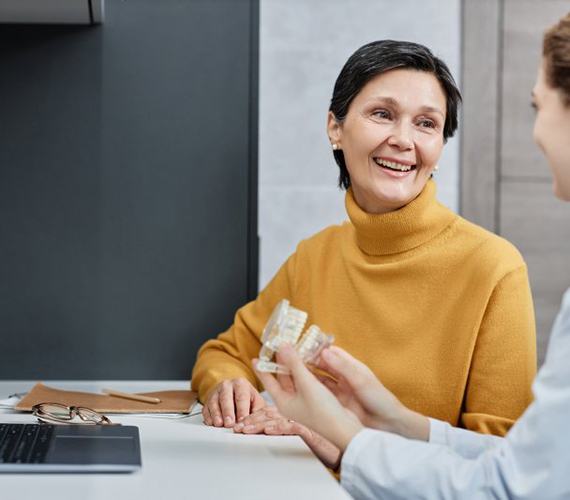 Patient in Fort Worth talking to dentist about oral cancer
