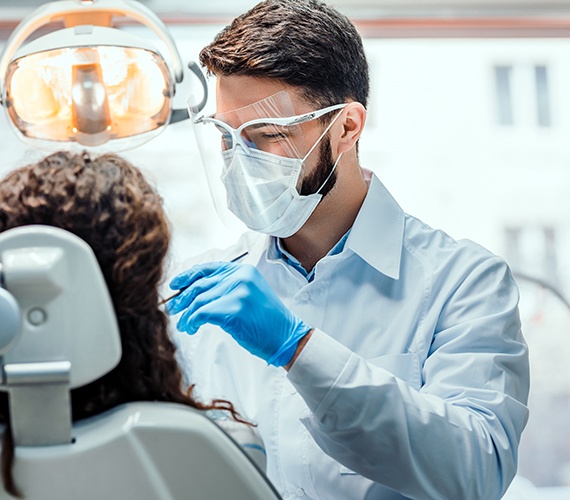 Patient in Fort Worth getting an oral cancer screening