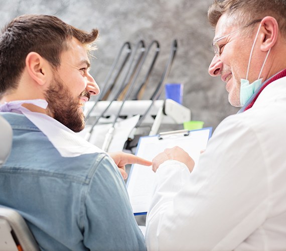 Patient in Fort Worth smiling after oral cancer screening